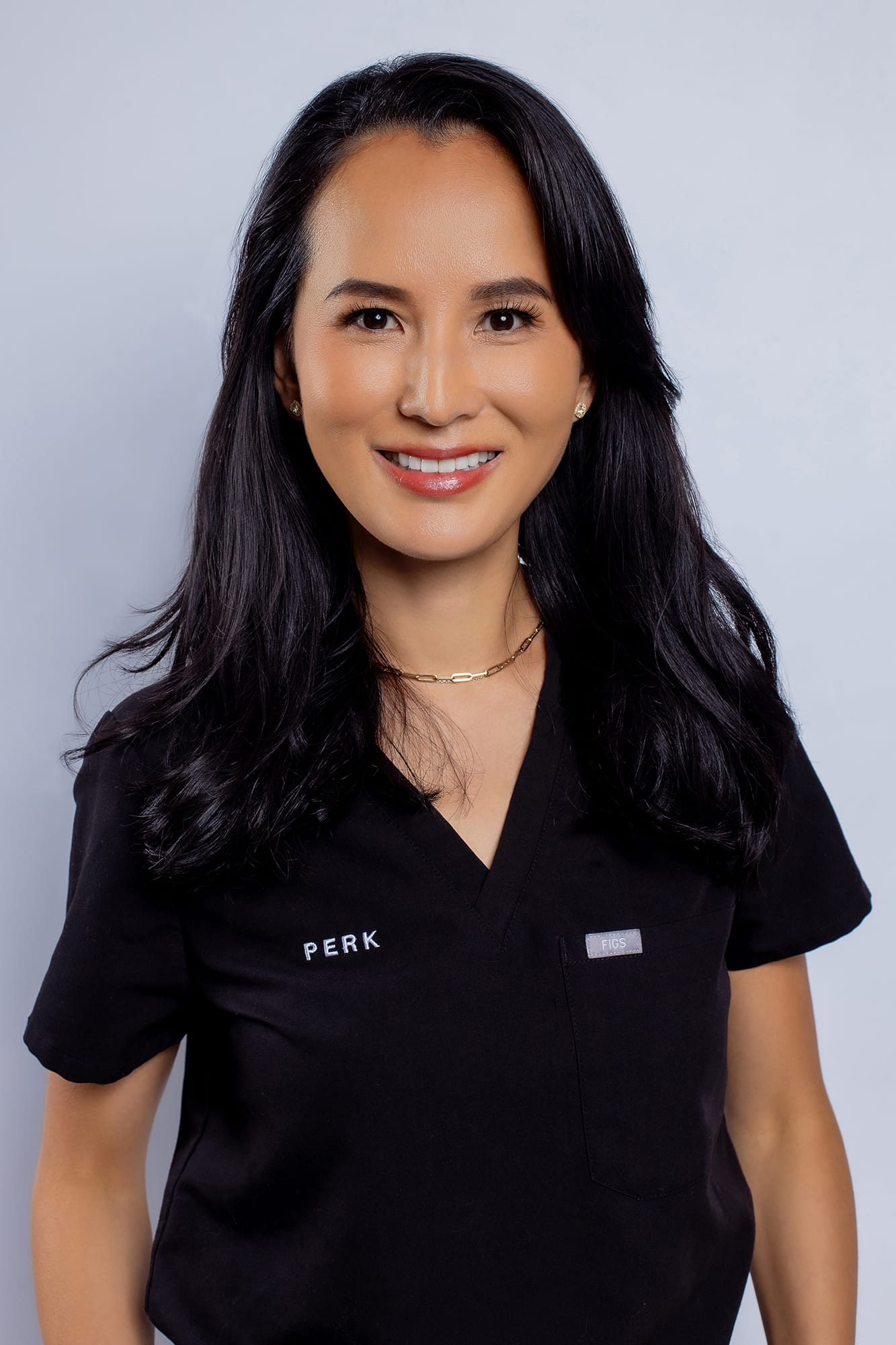 Portrait of Dr. Lee in scrubs