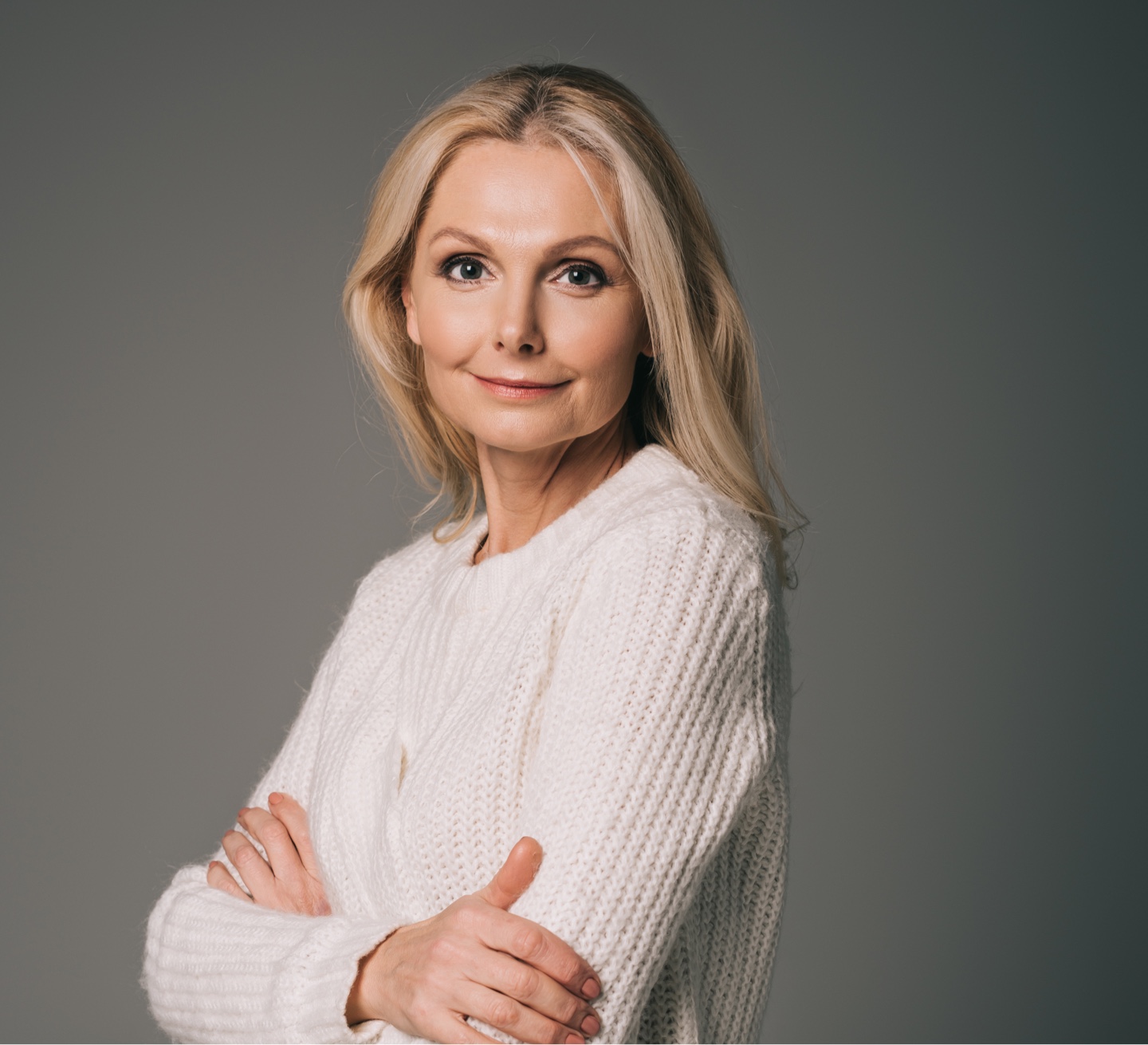 middle aged woman in a sweater