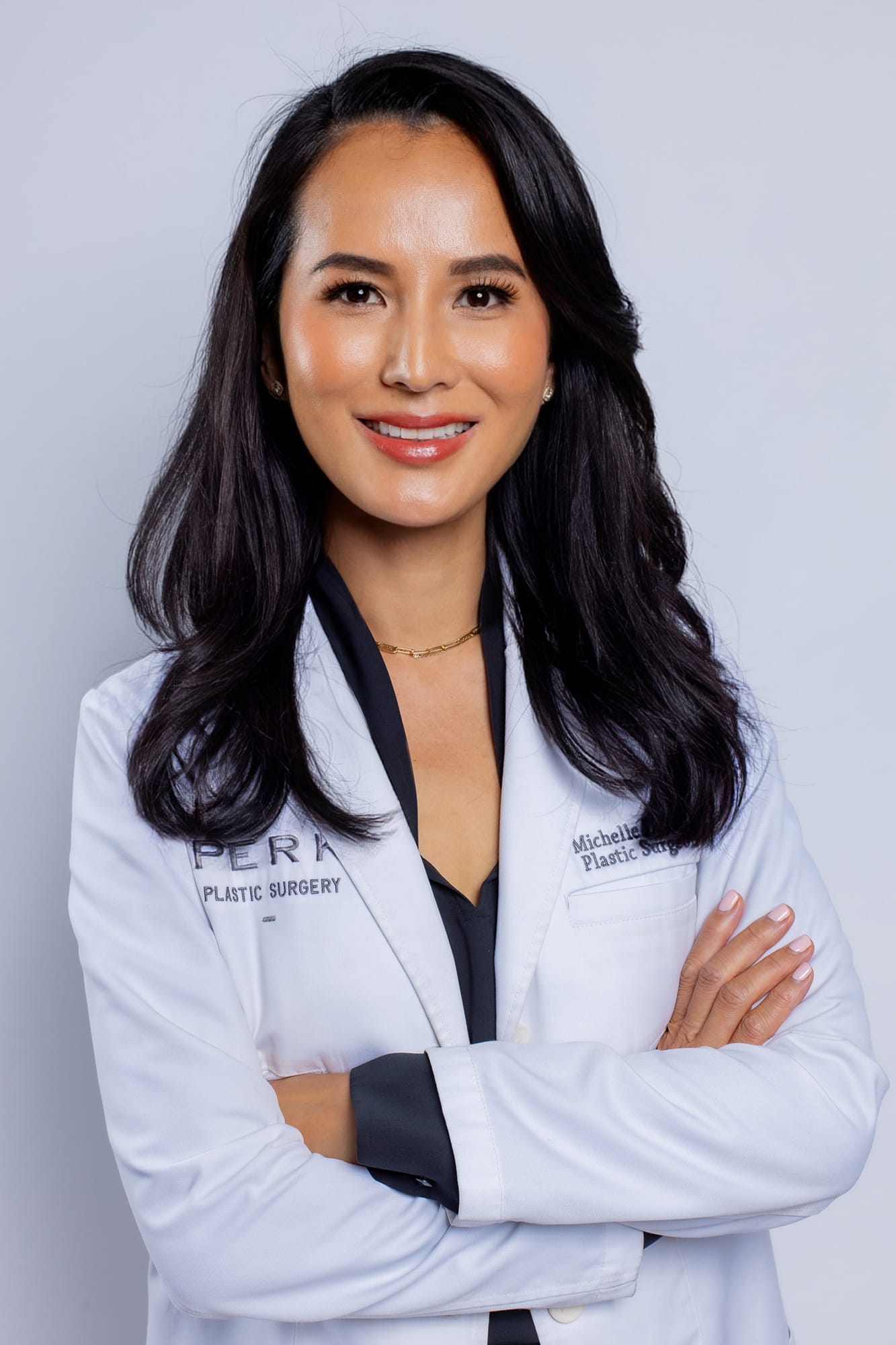 Dr. Michelle Lee in her doctor's coat