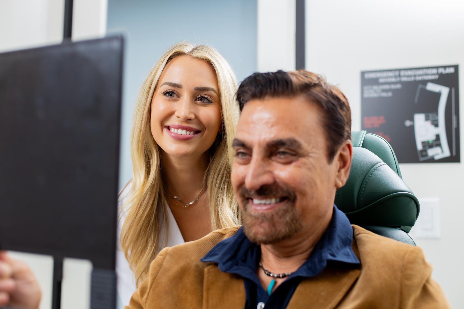 Woman smiling with patient